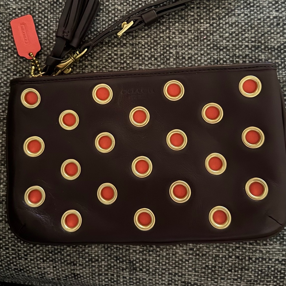 Coach brand new brown and orange wristlet
